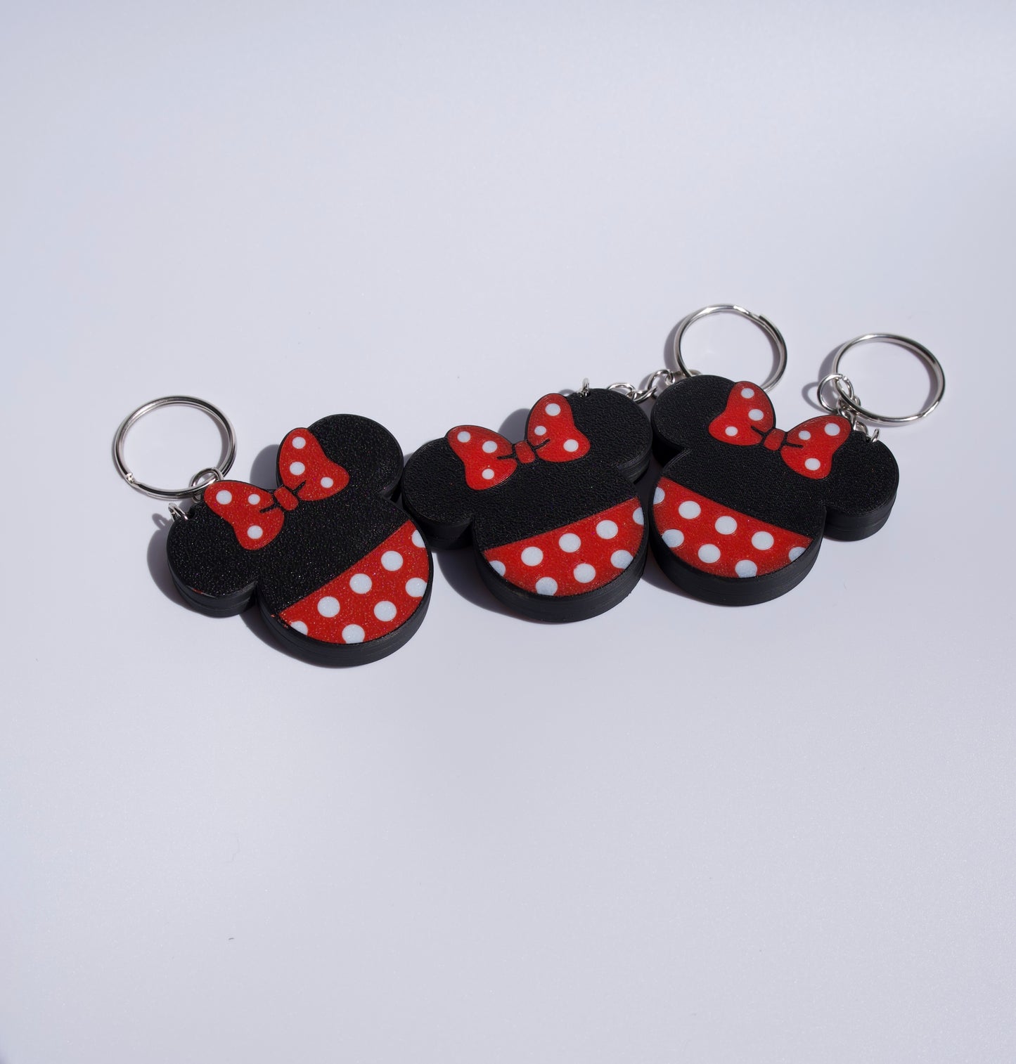 Custom 3D Printed Mickey & Minnie-inspired AirTag Keychains